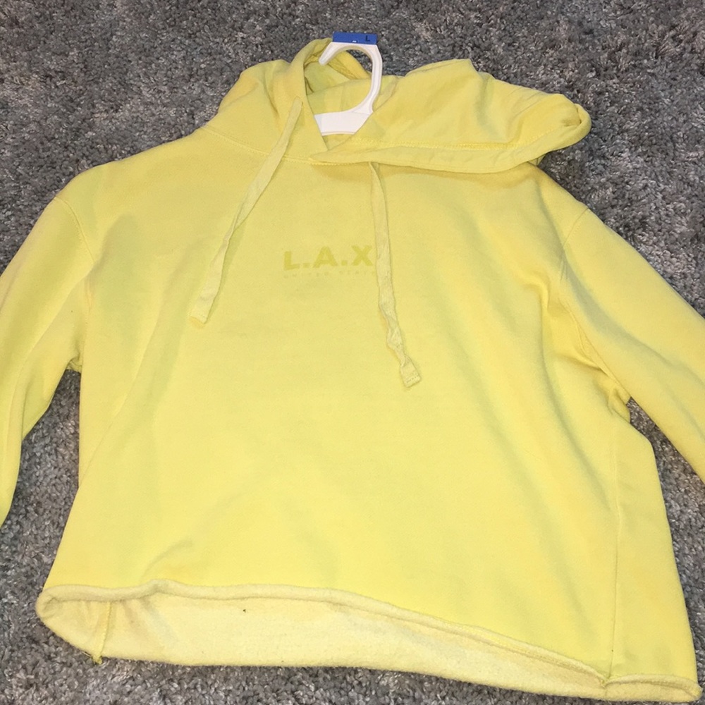 Yellow cropped long sleeve shirt